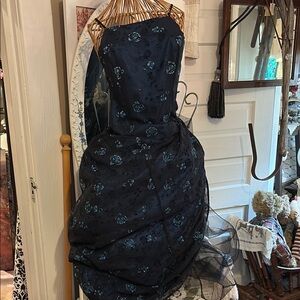 Blue Strapless Morgan and Co. gown by Linda Bernell.